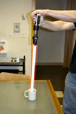 Lightsaber warming up a cup of coffee.