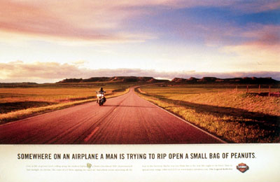 Motorcycle ad showing a wide open road